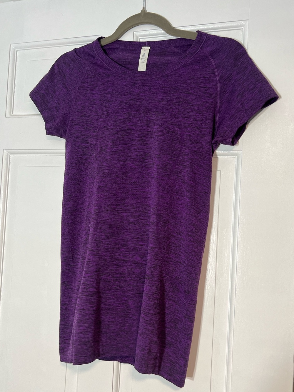 lululemon athletica Swiftly Tech Short  Sleeve Top Hip Length Plum Size 6